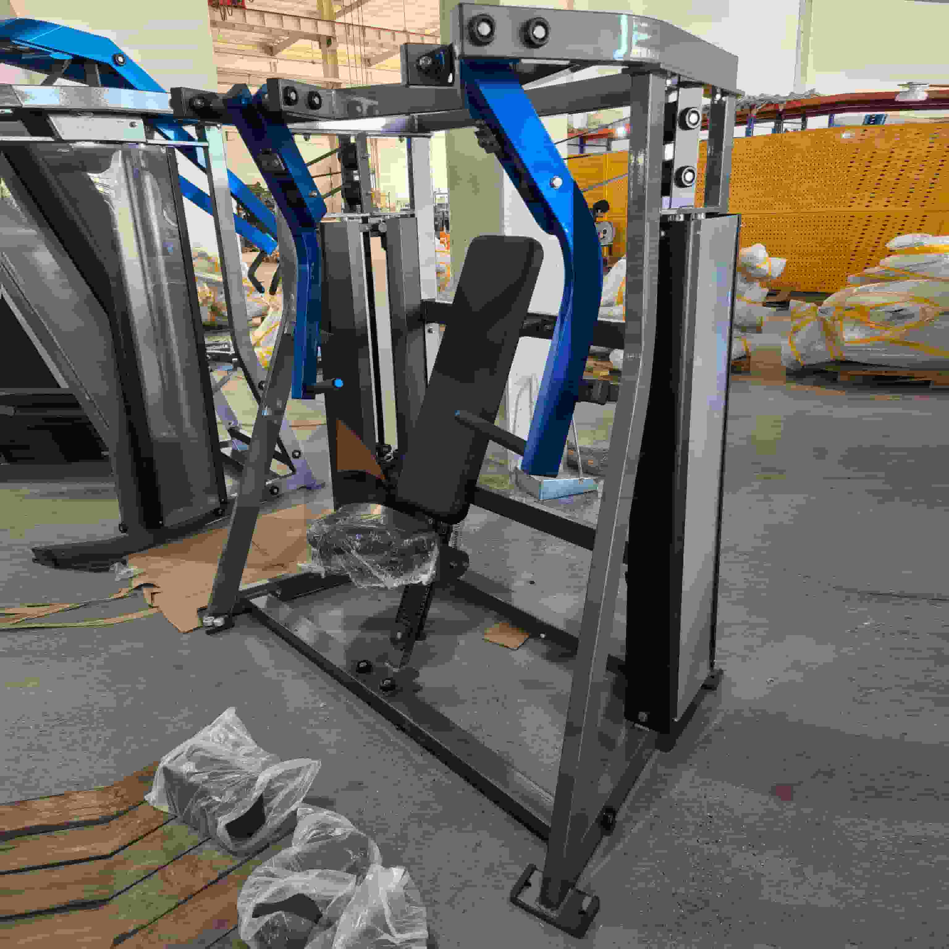 Pin Loaded ປະຕິເສດການກົດຫນ້າເອິກ